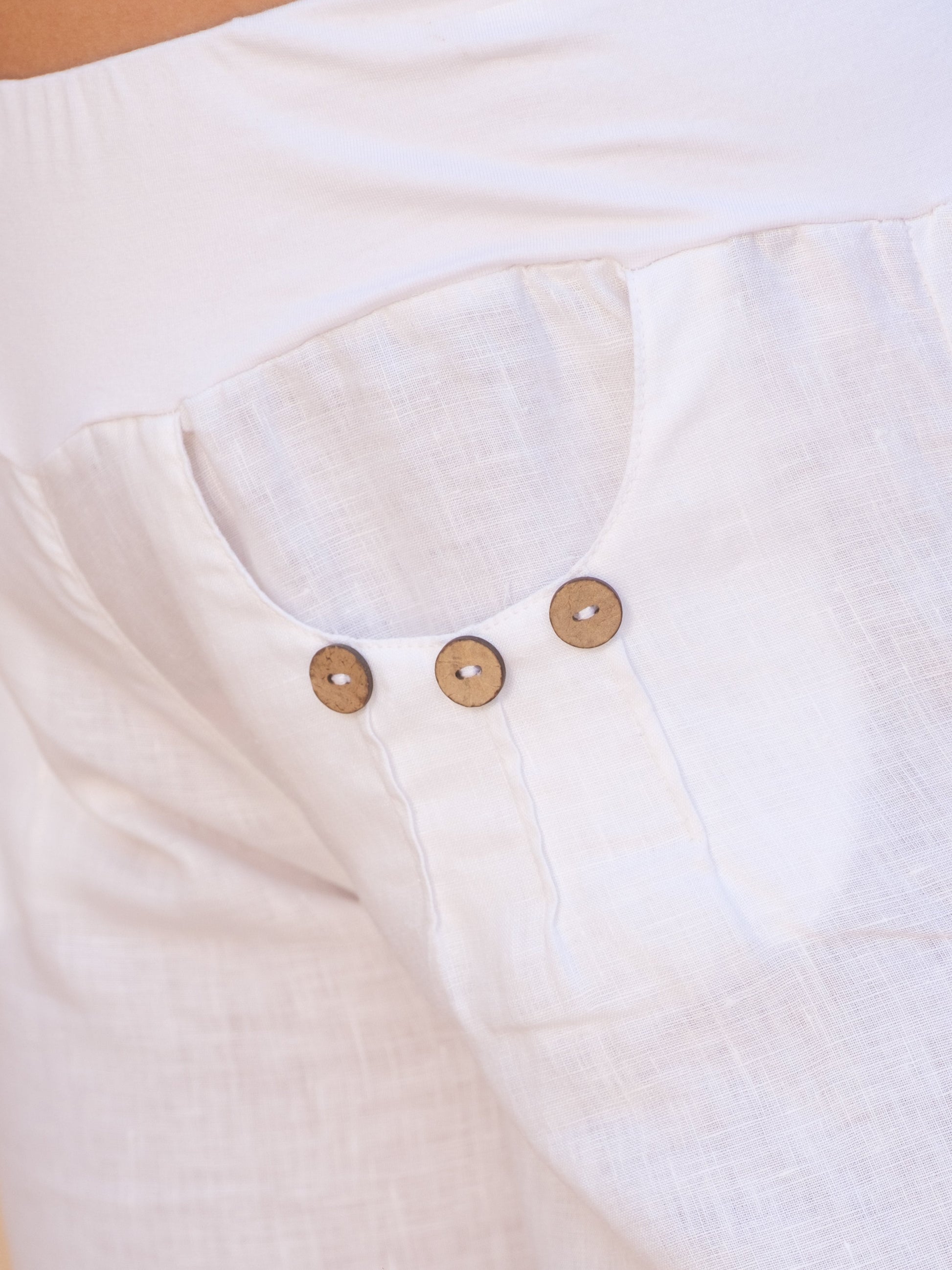 Womens Cropped Linen Coco Pants White Elastic Waist Curved Hem Coconut Button Pocket